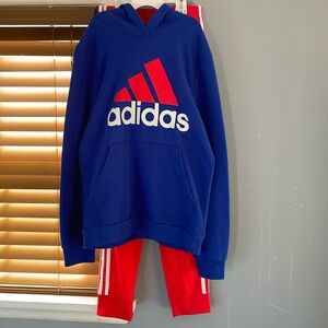 Big boys red with white stripes adidas track pants with matching blue hoodie